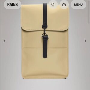 New with tags Rains backpack in tan and black